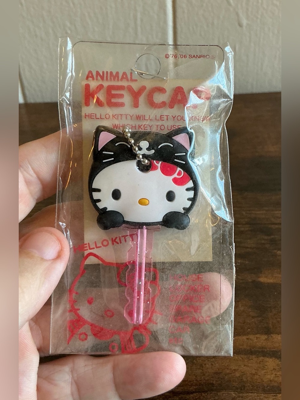 A Vintage NWT 2006 Sanrio Hello Kitty Black Cat Animal Keycap Cover